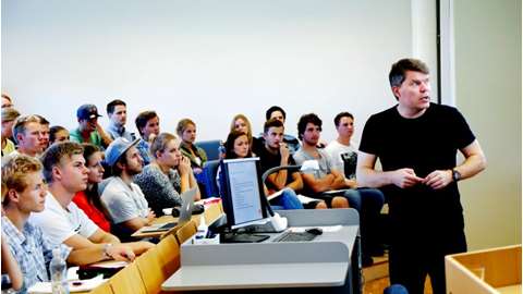 Professor delivers a lecture to students 
