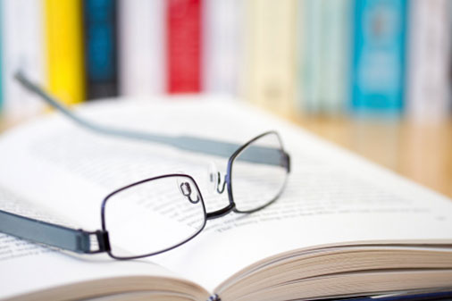 An open book lies on a table 