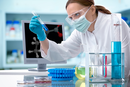 Woman conducts scientific experiments in laboratory